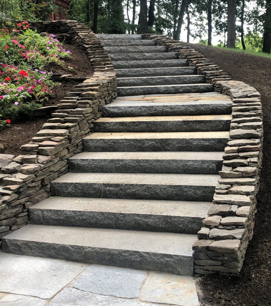 Stair with retaining wall.